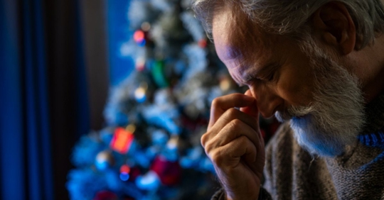 sad older man at Christmas
